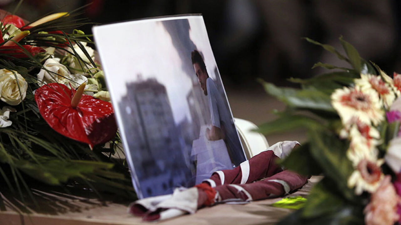 A picture of Associated Press video journalist Camilli is seen during his funeral ceremony at the Pitigliano Cathedral in Tuscany A picture of Associated Press video journalist Simone Camilli, who was killed Wednesday in an explosion in Gaza, is seen during his funeral ceremony at the Pitigliano Cathedral in Tuscany, August 15, 2014. Camilli, 35, a video journalist working for the Associated Press, was the first international journalist killed in the latest Gaza conflict. REUTERS/Riccardo De Luca/Pool (ITALY - Tags: MEDIA POLITICS OBITUARY CONFLICT) - RTR42L2M
