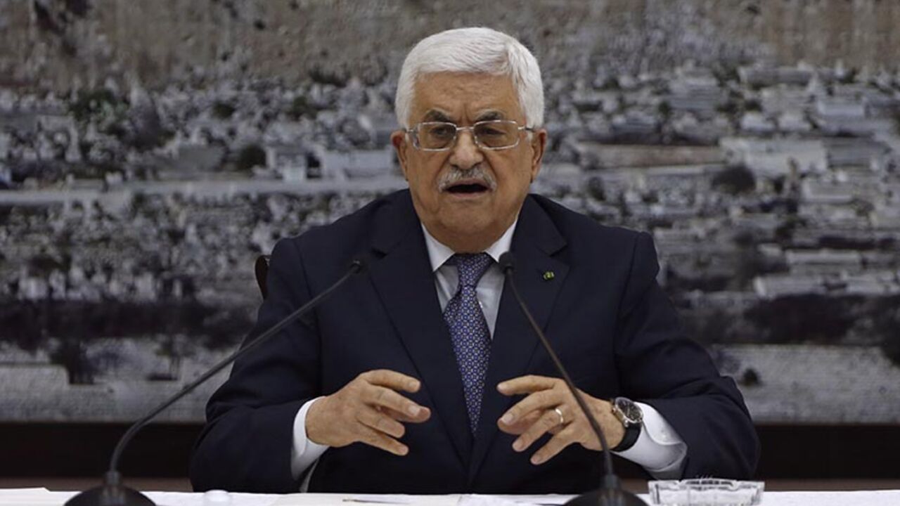 Palestinian President Mahmoud Abbas gestures during a meeting with Palestinian leadership in the West Bank city of Ramallah Palestinian President Mahmoud Abbas gestures during a meeting with Palestinian leadership in the West Bank city of Ramallah August 26, 2014. Israel has accepted an Egyptian proposal for a Gaza ceasefire, a senior Israeli official said on Tuesday. Egyptian and Palestinian officials said the truce was to take effect at 7 pm (1600 GMT). REUTERS/Mohamad Torokman (WEST BANK - Tags: POLITICS PROFILE) - RTR43V6L