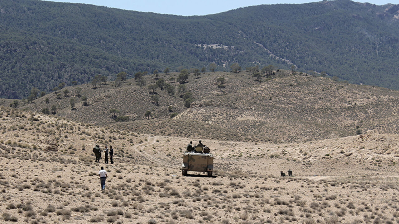 Tunisian soldiers patrol near the border with Algeria as seen from the area of Mount Chambi Tunisian soldiers patrol near the border with Algeria as seen from the area of Mount Chambi, west Tunisia June 11, 2013. A mine exploded this morning injuring one local shepherd near Mount Chaambi in Kasserine governorate near a closed military area, according to local media reports. REUTERS/Stringer (TUNISIA - Tags: MILITARY) - RTX10K2F