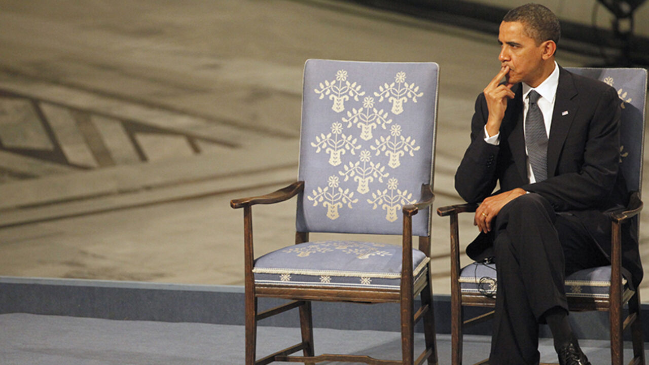 US President Obama listens to a performance during the Nobel Peace Prize award ceremony in Oslo Nobel Peace Prize laureate U.S. President Barack Obama listens to a performance during the Nobel Peace Prize award ceremony at Oslo City Hall December 10, 2009. The Nobel committee is awarding the peace prize to Obama for "his extraordinary efforts to strengthen international diplomacy and cooperation between peoples" and cited his push for nuclear disarmament. REUTERS/Thomas Peter (NORWAY) - RTXRP1N