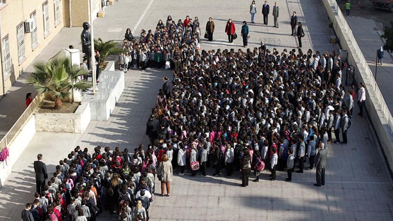 Turkish children sing the national anthem before their lesson at a school in Hatay Turkish children sing the national anthem before their lesson at a school in Hatay April 2, 2012. REUTERS/Osman Orsal (TURKEY - Tags: SOCIETY) - RTR309SU