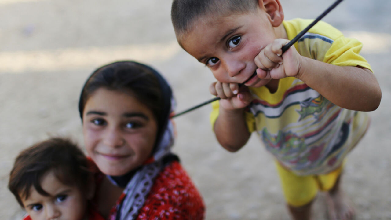 Displaced Iraqi children who fled from Islamic Sate violence in Mosul play outside their tent at Baherka refugee camp in Erbil Displaced Iraqi children, who fled from Islamic Sate violence in Mosul, play outside their tent at Baherka refugee camp in Erbil September 14, 2014. REUTERS/Ahmed Jadallah (IRAQ - Tags: CIVIL UNREST CONFLICT SOCIETY) - RTR4667F