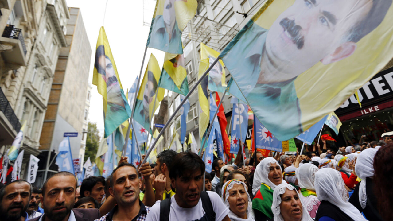 People carry flags bearing the portrait of Ocalan, one of founding members of militant organisation, Kurdistan Workers' Party, during a pro-Kurdish protest against Islamic State militant attacks on Syrian Kurds, in Istanbul People carry flags bearing the portrait of Abdullah Ocalan, one of the founding members of the militant organisation, the Kurdistan Workers' Party, during a pro-Kurdish protest against Islamic State (IS) militant attacks on Syrian Kurds, in Istanbul September 21, 2014. REUTERS/Murad Sezer (TURKEY - Tags: POLITICS CIVIL UNREST) - RTR473RF