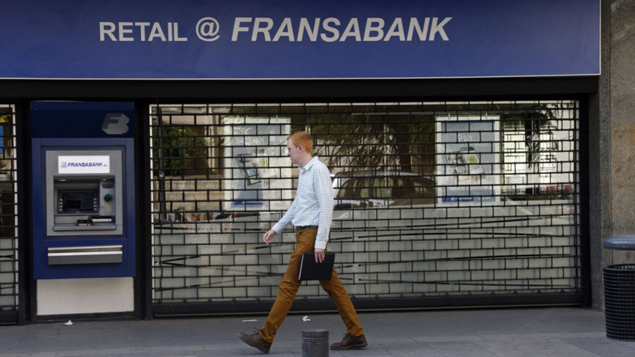 A man walks past a closed branch of Fransabank in Beirut A man walks past a closed branch of Fransabank in Beirut September 4, 2013. Banks and private business corporations saw a one-day strike being held in many parts of Lebanon on Wednesday, organised by economic committees aiming to pressure Lebanese political parties to form a cabinet to maintain the country's economy, local media reported. REUTERS/Mohamed Azakir (LEBANON - Tags: BUSINESS) - RTX136NZ