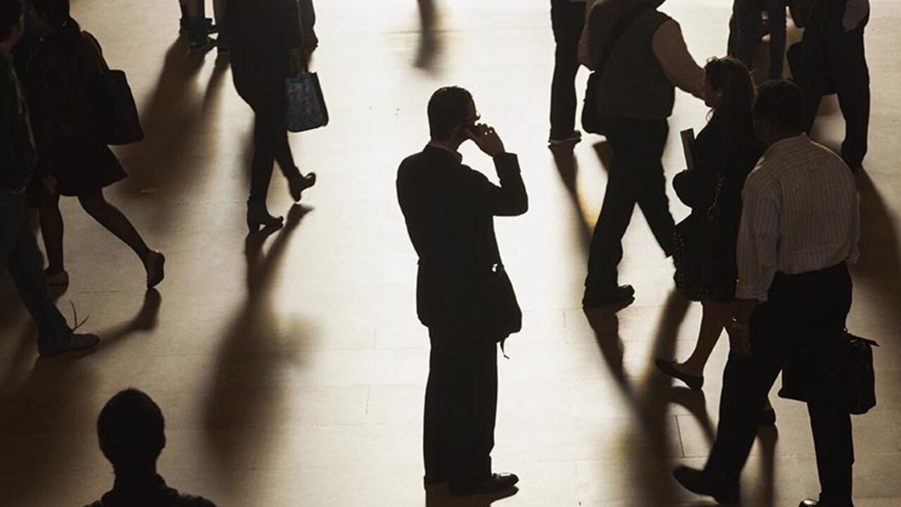 A man stands in Grand Central Terminal, as passengers face limited train service on New Haven Line between Stamford Station and Grand Central Terminal due to Con Edison power problem in New York A man stands in the middle of Grand Central Terminal as he speaks on a cell phone, as passengers face limited train service on the New Haven Line between Stamford Station and Grand Central Terminal due to a Con Edison power problem in New York, September 25, 2013. REUTERS/Zoran Milich (UNITED STATES - Tags: TRANSPORT ENERGY TPX IMAGES OF THE DAY) - RTX13Z4Q