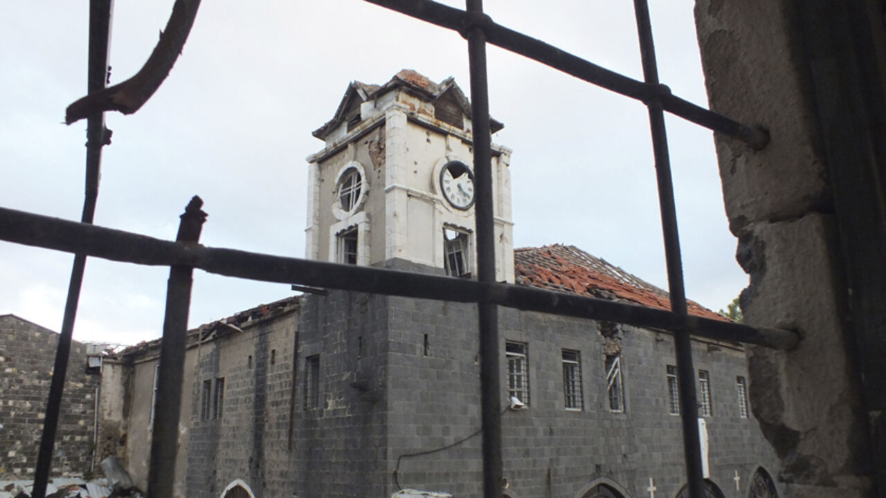 An old damaged Orthodox Church is pictured in the besieged area of Homs An old damaged Orthodox Church is pictured in the besieged area of Homs December 8, 2013. REUTERS/Yazan Homsy (SYRIA - Tags: POLITICS CIVIL UNREST CONFLICT RELIGION) - RTX16A57