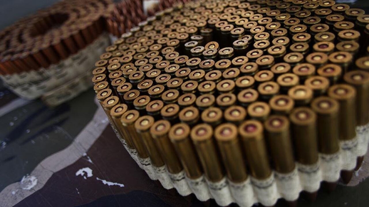 Bullets are displayed on a table during the Big Sandy Shoot in Mohave County Bullets are displayed on a table during the Big Sandy Shoot in Mohave County, Arizona March 22, 2013. The Big Sandy Shoot is the largest organized machine gun shoot in the United States attended by shooters from around the country. Vintage and replica style machine guns and cannons are some of the weapons displayed during the event. Picture taken March 22, 2013. REUTERS/Joshua Lott (UNITED STATES - Tags: SOCIETY) - RTXXWYG