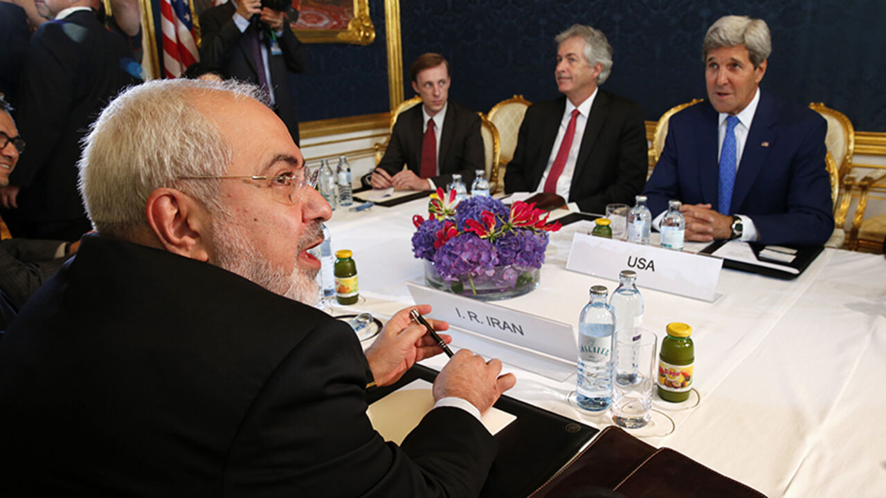 Iran's Foreign Minister Zarif holds a bilateral meeting with U.S. Secretary of State Kerry in Vienna Iran's Foreign Minister Javad Zarif (L) holds a bilateral meeting with U.S. Secretary of State John Kerry (R) on the second straight day of talks over Tehran's nuclear program in Vienna, July 14, 2014. Kerry will press his Iranian counterpart Zarif to make "critical choices" in a second straight day of talks over Tehran's nuclear program on Monday, a U.S. official said. REUTERS/Jim Bourg (AUSTRIA - Tags: POLITICS ENERGY) - RTR3YJOW