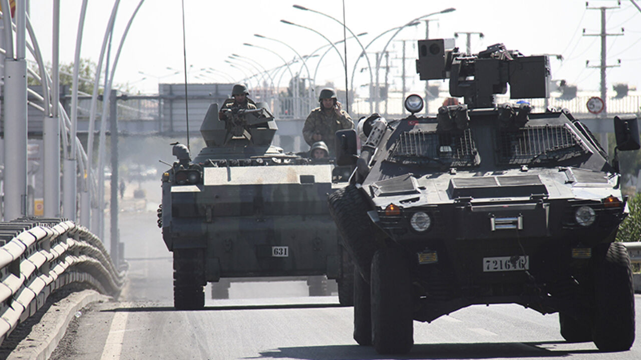 Turkish soldiers in armoured vehicles patrol the streets of Diyarbakir Turkish soldiers in armoured vehicles patrol the streets of Diyarbakir October 8, 2014. At least 12 people died on Tuesday during violent clashes across Turkey, local media reported, as the fate of the besieged Syrian border town of Kobani stirred up decades of tensions with Turkey's Kurdish minority. Violence erupted in Turkish towns and cities mainly in the Kurdish southeastern provinces, as protesters took to the streets to demand the government do more to protect Kobani, a predominantly Kurdish settleme
