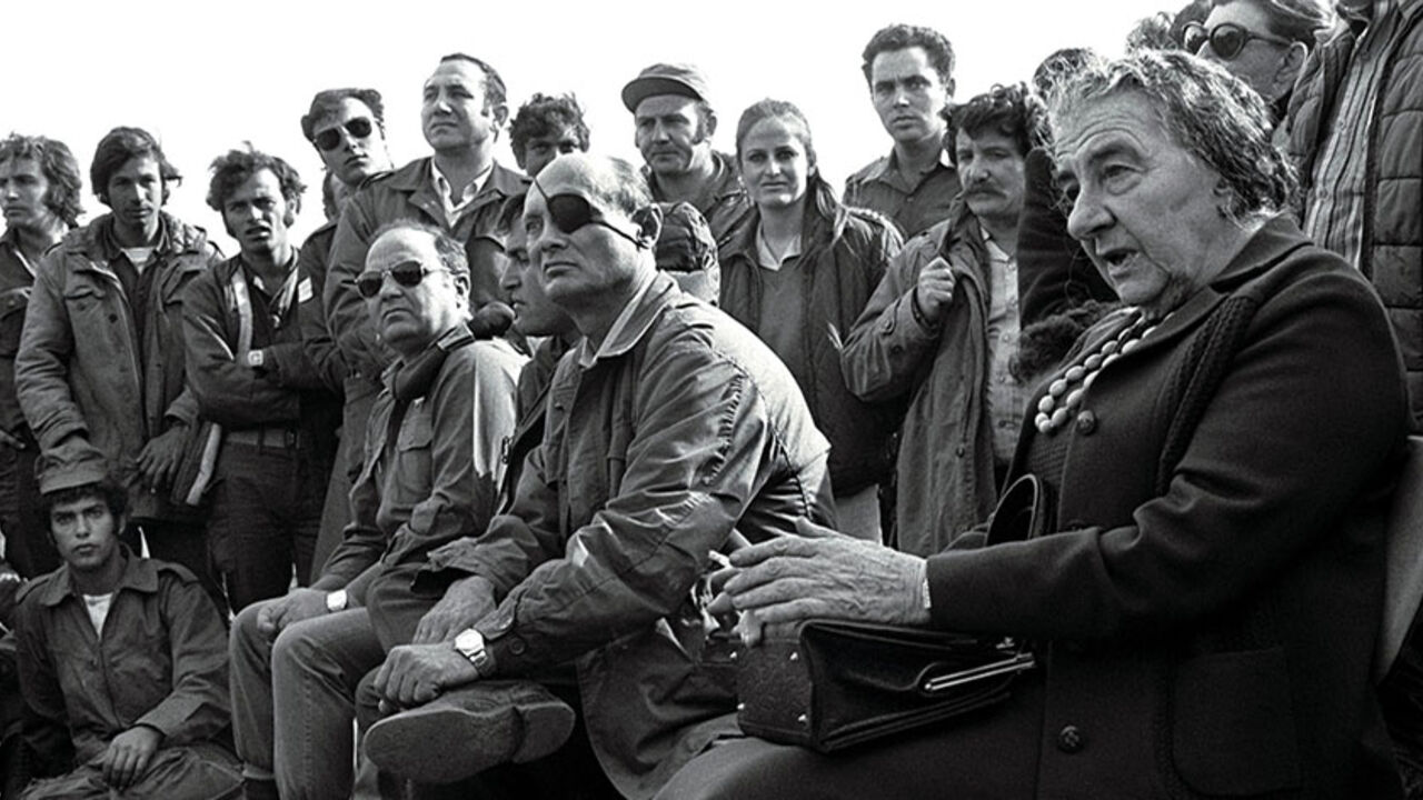 ISRAEL - FILE PHOTO 21NOV73 - Prime Minister Golda Meir (R) accompanied by her Defense Minister Moshe Dayan, meets with Israeli soldiers at a base on the Golan Heights after intense fighting during the 1973 Yom Kippur War.[ Israel was simultaneously attacked by Syria and Egypt on Yom Kippur, the Jewish Day of Atonement when all of Israel comes to a standstill, and was only able to defeat both countries when the United States provided an emergency major resupply of equipment. Israel suffered heavy causalities and m