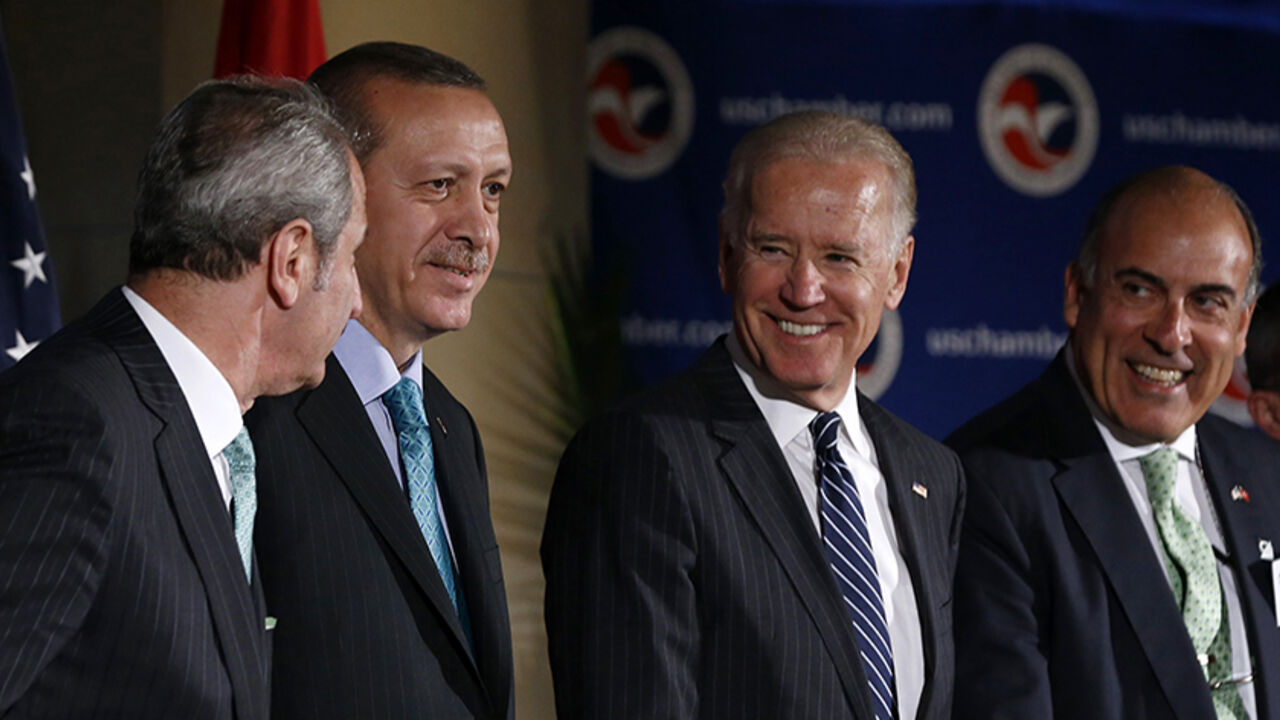 U.S. Vice President Joe Biden is pictured with Turkey's Prime Minister Recep Tayyip Erdogan during an event at the U.S. Chamber of Commerce in Washington U.S. Vice President Joe Biden is pictured with Turkey's Prime Minister Recep Tayyip Erdogan (2nd L) during an event at the U.S. Chamber of Commerce in Washington, May 16, 2013. Pictured at right is Coca Cola CEO Muhtar Kent. REUTERS/Jason Reed (UNITED STATES - Tags: POLITICS) - RTXZPQL