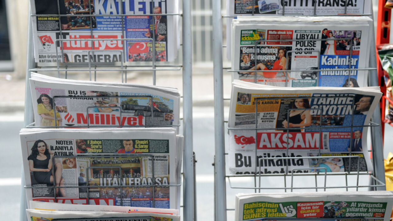 Newspapers are displayed at a newsstand Newspapers are displayed at a newsstand on January 24, 2012 in the Karakoy neighborhood of Istanbul. Turkish newspapers criticized the January 23 vote by the French Senate making denial of the Armenian genocide a crime. The French Senate on January 23 approved, by 127 votes to 86, the measure which makes it an offence punishable by jail in France to deny that the 1915 massacre of Armenians by Ottoman Turk forces amounted to genocide. Turkish Prime Minister Recep Tayyip Erdogan on January 24 slammed as discr