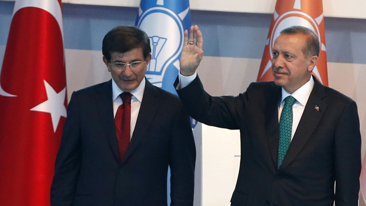 Turkey's President-elect Erdogan and incoming PM Davutoglu leave the stage together during the Extraordinary Congress of the ruling AK Party (AKP) in Ankara Turkey's President-elect Tayyip Erdogan (R) and incoming prime minister Ahmet Davutoglu leave the stage together during the Extraordinary Congress of the ruling AK Party (AKP) in Ankara August 27, 2014. Erdogan said on Wednesday he would ask Davutoglu to form a new government on Thursday, and a new cabinet of ministers would be announced the following day. REUTERS/Umit Bektas (TURKEY - Tags: POLITICS) - RTR43Z11