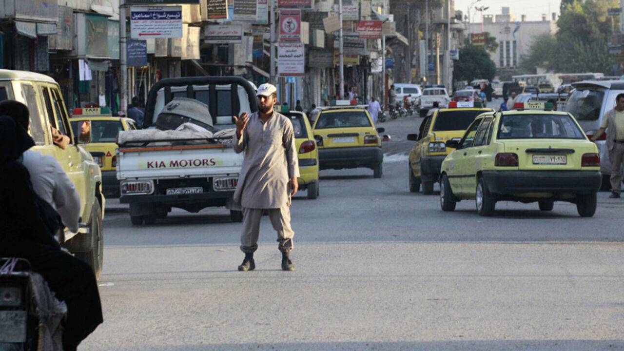 An Islamic State policeman controls traffic in Raqqa An Islamic State policeman controls traffic in Raqqa September 18, 2014. Picture taken September 18, 2014. REUTERS/Stringer (SYRIA - Tags: TRANSPORT SOCIETY) - RTR46TUK