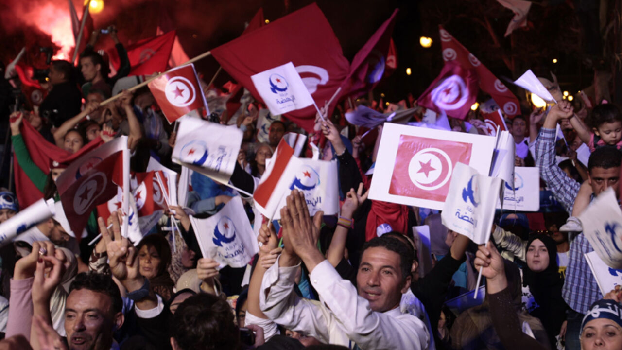 Supporters of the Islamist Ennahda movement wave party flags during a campaign event in Tunis Supporters of the Islamist Ennahda movement wave party flags during a campaign event in Tunis October 24, 2014. Tunisia will hold parliamentary elections on October 26 and a presidential ballot in November. REUTERS/Zoubeir Souissi (TUNISIA - Tags: ELECTIONS POLITICS) - RTR4BIKG