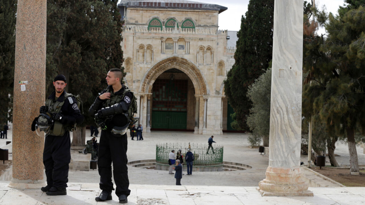 Israeli police officers stand guard on the compound known to Muslims as Noble Sanctuary and to Jews as Temple Mount in Jerusalem's Old City Israeli police officers stand guard on the compound known to Muslims as Noble Sanctuary and to Jews as Temple Mount in Jerusalem's Old City November 5, 2014. As Jordan joins a military campaign against Islamic State militants in Syria, tensions in Jerusalem pose a potentially bigger risk to a nation only slightly scathed by the turmoil sweeping the Middle East. Picture taken November 5, 2014.
To match Insight MIDEAST-CRISIS/JORDAN-STABILITY
REUTERS/Ammar Awad (JERUSALEM - Tags: MILITARY POLITICS RELIGION C