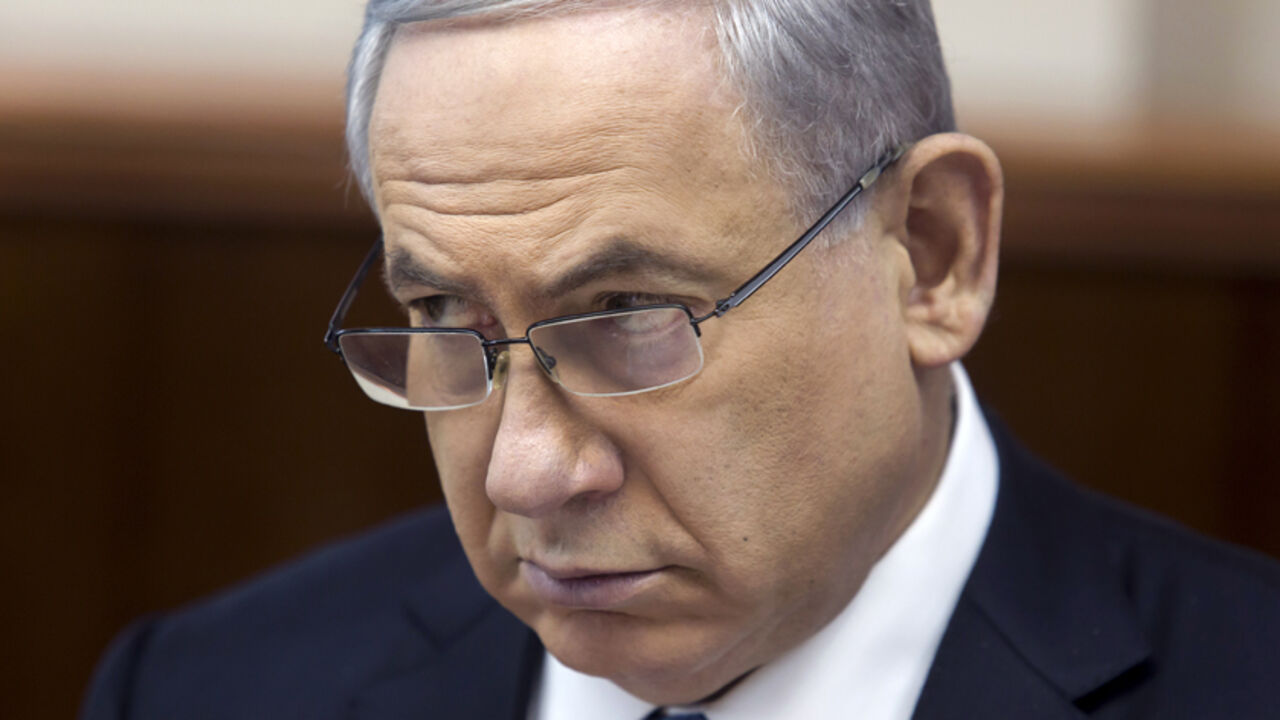 Israel's Prime Minister Netanyahu attends the weekly cabinet meeting in Jerusalem Israel's Prime Minister Benjamin Netanyahu attends the weekly cabinet meeting in Jerusalem November 23, 2014. REUTERS/Jim Hollander/Pool (JERUSALEM - Tags: POLITICS) - RTR4F81N