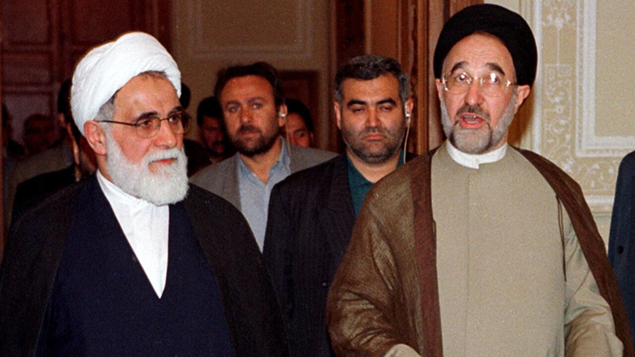 PRESIDENT KHATAMI ENTERS NEWLY REFURBISHED OLD PARLIAMENT BUILDING. Iranian President Mohammad Khatami (R) accompanied by Speak of Parliament Ali Akbar Nateq-Nouri (L) reacts upon entering the newly refurbished old parliament building in Tehran's Baharestan Square May 22. Khatami said Iran was the first country in the Middle East region to experience popular democracy.
cjf - RTR4KFE