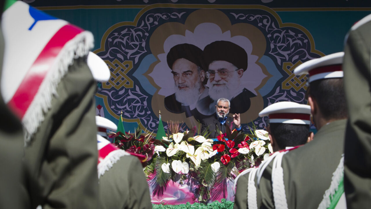 EDITORS' NOTE: Reuters and other foreign media are subject to Iranian restrictions on leaving the office to report, film or take pictures in Tehran.

Hamas Leader Ismail Haniyeh speaks during a ceremony to mark the 33rd anniversary of the Islamic Revolution, in Tehran's Azadi square February 11, 2012. REUTERS/Raheb Homavandi  (IRAN - Tags: ANNIVERSARY POLITICS RELIGION) - RTR2XN6M