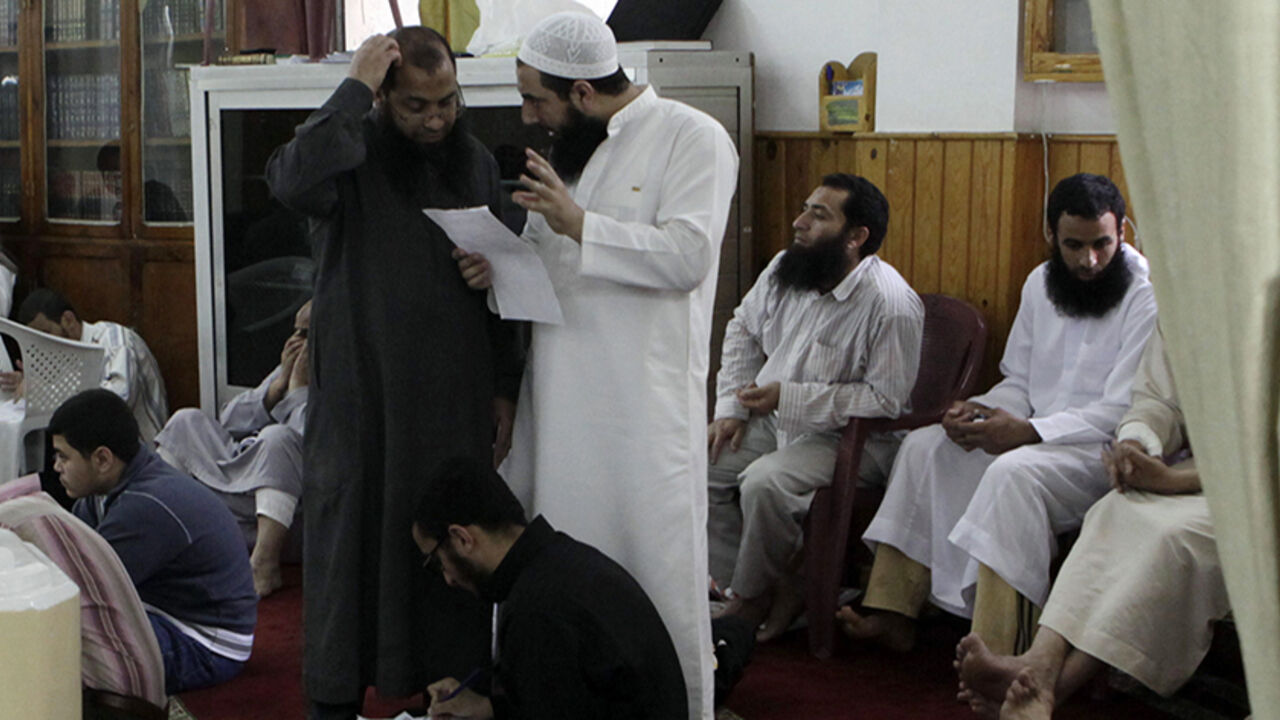 EGYPT/ Egypt's ultra-conservative Muslims, Salafists, attend a religious lesson at a mosque popular with Salafists in Alexandria April 6, 2012. Salafists have ventured into public life more prominently after the revolution that toppled former president Hosni Mubarak.
REUTERS/Asmaa Waguih (EGYPT - Tags: RELIGION) - RTR30FIV