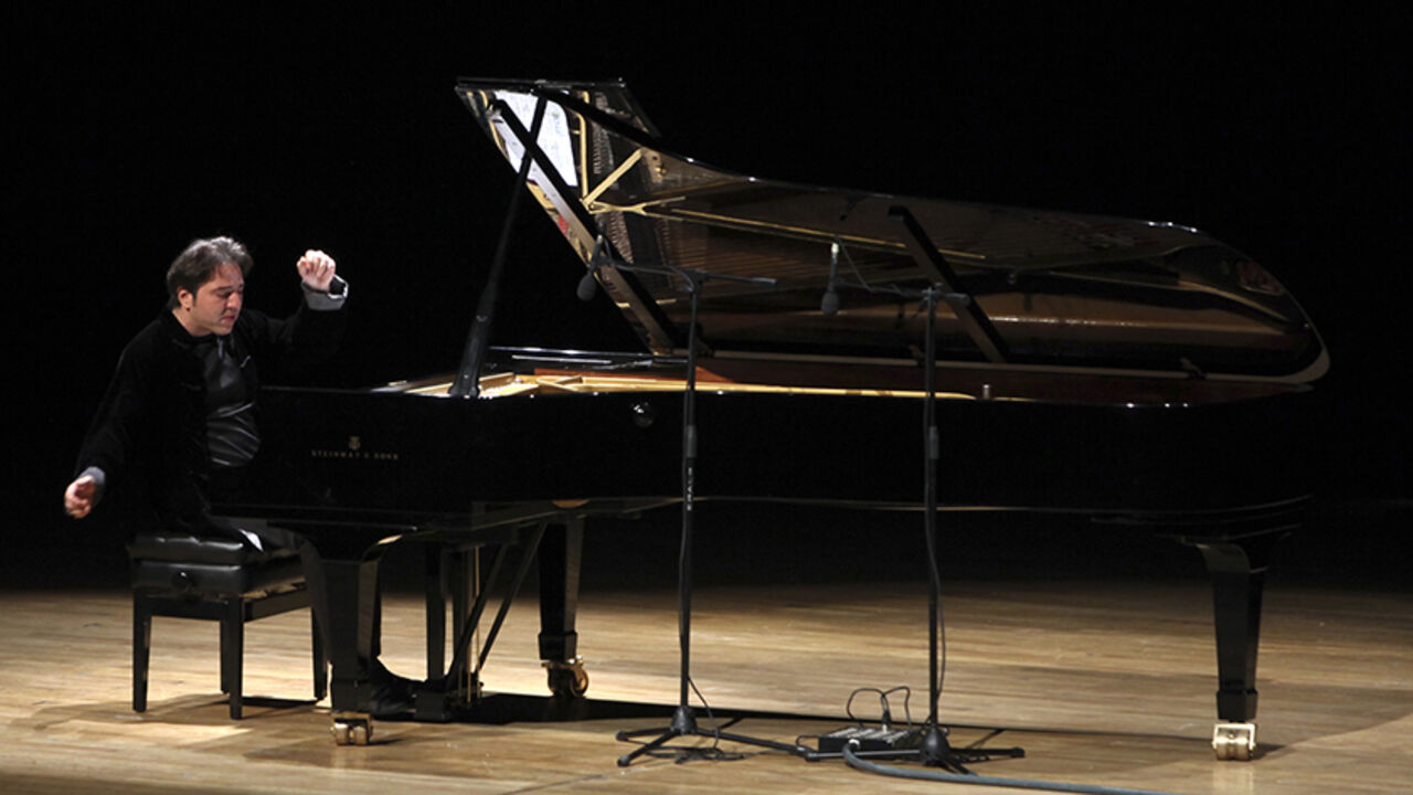 TURKEY/ Turkish classical pianist Fazil Say performs during a concert in Ankara October 14, 2010. Internationally acclaimed Turkish classical pianist Fazil Say goes on trial on charges of insulting Muslim religious values in comments he posted on Twitter. REUTERS/Stringer (TURKEY - Tags: POLITICS CIVIL UNREST SOCIETY) - RTR399ZY