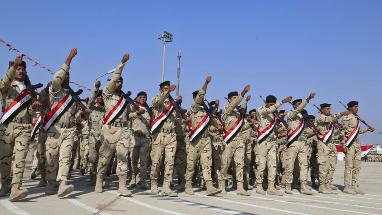 Iraqi soldiers march during a graduation ceremony in Baghdad Iraqi soldiers march during a graduation ceremony in Baghdad November 18, 2014.REUTERS/Stringer (IRAQ - Tags: MILITARY) - RTR4EN87