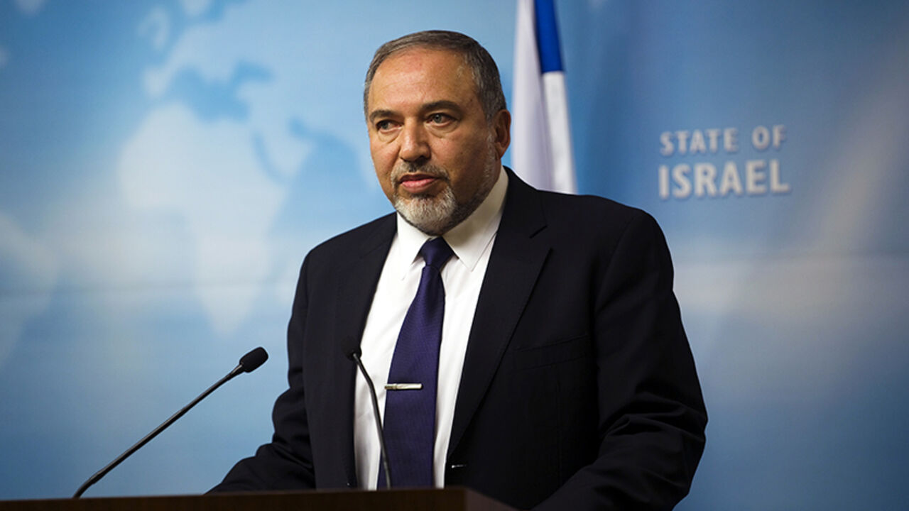 Israel's Foreign Minister Avigdor Lieberman gives a statement to the media at his Jerusalem office Israel's Foreign Minister Avigdor Lieberman gives a statement to the media at his Jerusalem office December 2, 2014. Israel appeared to be heading on Tuesday towards an early election after right-wing Prime Minister Benjamin Netanyahu and his major centrist coalition partner failed to patch up differences. Foreign Minister Avigdor Lieberman, head of the far-right Yisrael Beitenu party, told a news conference, "An election is a now a fact." REUTERS/ Ronen Zvulun (JERUSALEM - Tags: POLITICS) - RTR4GEQU