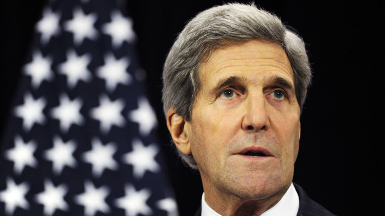 U.S. Secretary of State Kerry gives a statement after a round table meeting of the global coalition to counter the Islamic State militant group at NATO headquarters in Brussels U.S. Secretary of State John Kerry gives a statement after a round table meeting of the global coalition to counter the Islamic State militant group at NATO headquarters in Brussels December 3, 2014. The U.S.-led coalition has inflicted serious damage on Islamic State, carrying out around 1,000 air strikes so far in Iraq and Syria, but the fight against the militants could last years, U.S. Secretary of State John Kerry said on Wednesday. REUTERS/Eric Vidal (BELGIUM - Tags: POLITICS CIVIL UNREST TPX IMAGES