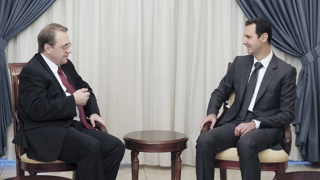Syria's President Bashar al-Assad (R) meets Russia's Deputy Foreign Minister Mikhail Bogdanov in Damascus December 10, 2014 in this picture released by Syria's national news agency SANA. REUTERS/SANA/Handout via Reuters (SYRIA - Tags: CIVIL UNREST POLITICS CONFLICT) 

ATTENTION EDITORS - THIS PICTURE WAS PROVIDED BY A THIRD PARTY. REUTERS IS UNABLE TO INDEPENDENTLY VERIFY THE AUTHENTICITY, CONTENT, LOCATION OR DATE OF THIS IMAGE. FOR EDITORIAL USE ONLY. NOT FOR SALE FOR MARKETING OR ADVERTISING CAMPAIGNS. T
