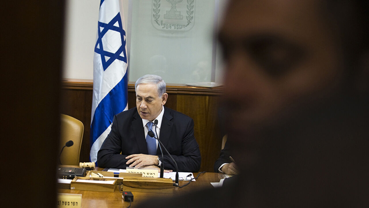 MIDEAST-ISRAEL/ Israel's Prime Minister Benjamin Netanyahu attends the weekly cabinet meeting in Jerusalem December 21, 2014. REUTERS/Amir Cohen (JERUSALEM - Tags: POLITICS) - RTR4IU96