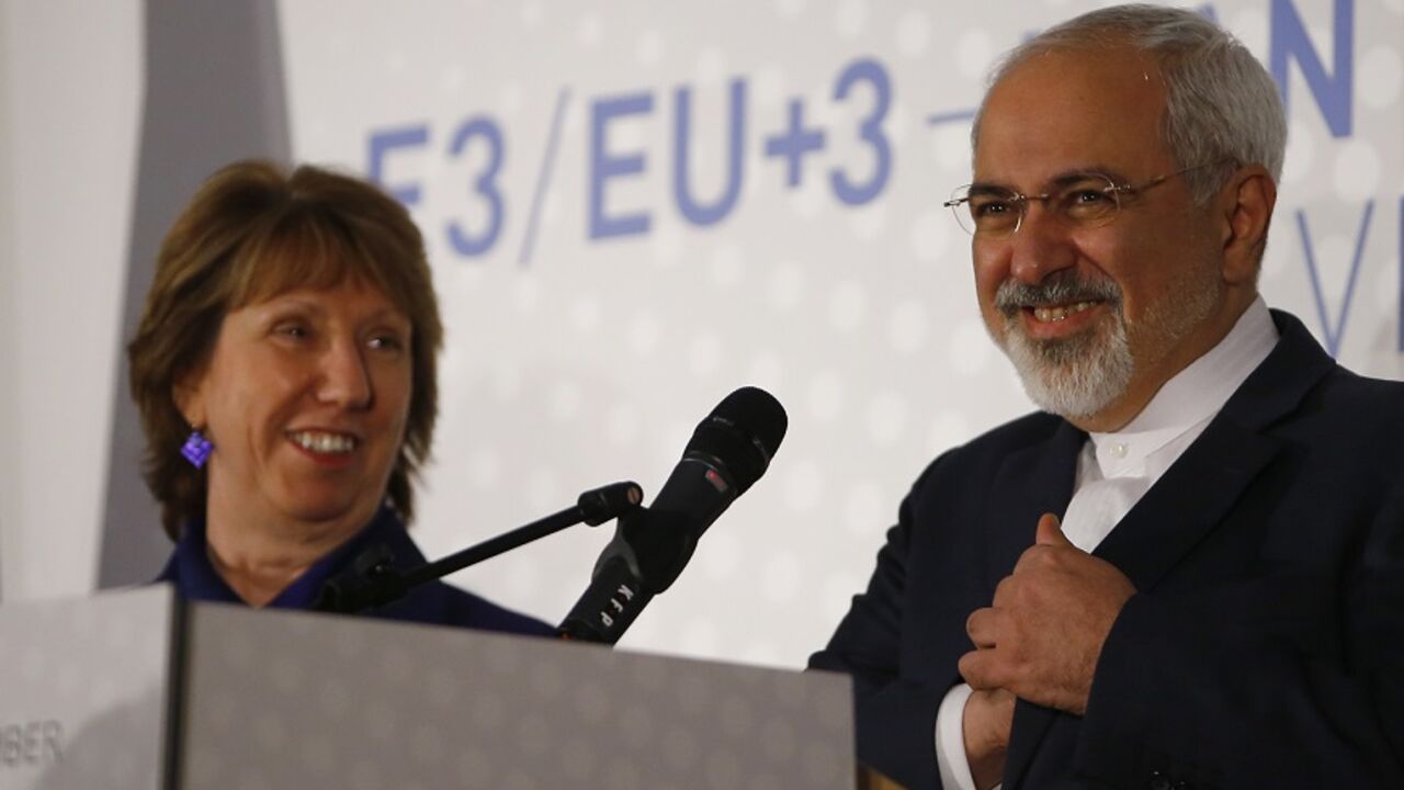 Iranian Foreign Minister Zarif and EU envoy Ashton address a news conference after a meeting in Vienna Iranian Foreign Minister Javad Zarif and EU envoy Catherine Ashton address a news conference after a meeting in Vienna November 24, 2014. Iran and six powers failed for a second time this year on Monday to resolve their 12-year dispute over Tehran's nuclear ambitions and gave themselves seven more months to overcome the deadlock that has prevented them from clinching an historic deal. REUTERS/Leonhard Foeger (AUSTRIA - Tags: POLITICS ENERGY) - RTR4FEIM