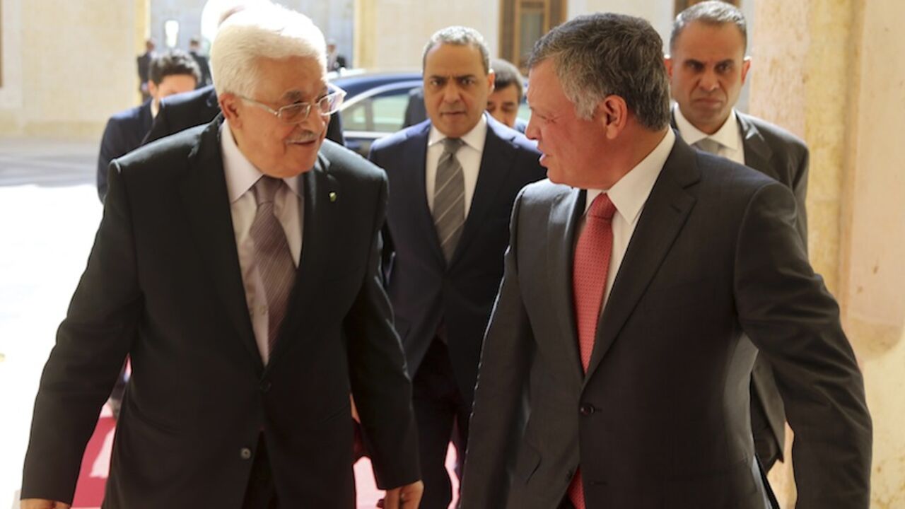 Jordan's King Abdullah welcomes Palestinian President Mahmoud Abbas at the Royal Palace in Amman Jordan's King Abdullah (R) welcomes Palestinian President Mahmoud Abbas at the Royal Palace in Amman July 24, 2014. REUTERS/Yousef Allan/Royal Palace/Handout via Reuters (JORDAN - Tags: POLITICS ROYALS) ATTENTION EDITORS - THIS PICTURE WAS PROVIDED BY A THIRD PARTY. REUTERS IS UNABLE TO INDEPENDENTLY VERIFY THE AUTHENTICITY, CONTENT, LOCATION OR DATE OF THIS IMAGE. FOR EDITORIAL USE ONLY. NOT FOR SALE FOR MARKETING OR ADVERTISING CAMPAIGNS. THIS PICTURE IS DISTRIBUTED EXACTLY AS RECEIVED BY REUTERS, AS A SE