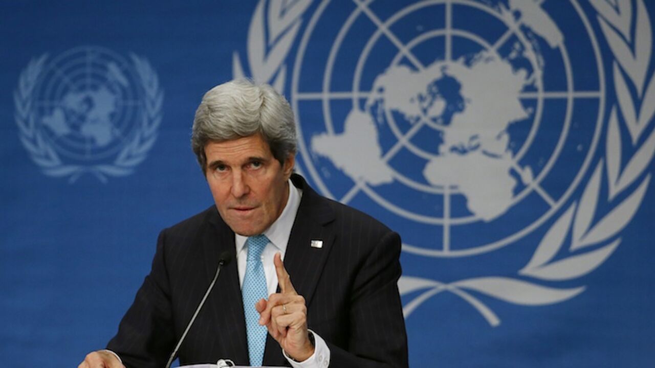 U.S. Secretary of State John Kerry addresses a news conference after the Geneva-2 peace talks in Montreux U.S. Secretary of State John Kerry addresses a news conference after the Geneva-2 peace talks in Montreux January 22, 2014. Kerry on Wednesday left the door open for Iran to participate in Syrian peace talks, saying Tehran could make a difference in ending the conflict. REUTERS/Arnd Wiegmann (SWITZERLAND - Tags: CIVIL UNREST POLITICS CONFLICT TPX IMAGES OF THE DAY) - RTX17Q69