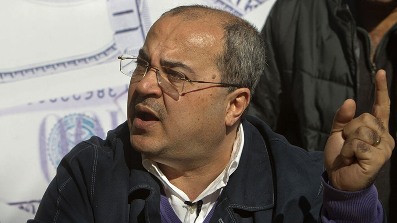 Nic6175890 Knesset (parliament) member Israeli Arab Ahmad Tibi campaigns seeking reelection ahead of Israel's general elections in the Israeli Arab town of Umm al-Fahm on January 14, 2013. Arab-Israelis, descendants of the 160,000 Palestinians who stayed on after the creation of Israel in 1948, make up 20 percent of the population. AFP PHOTO/AHMAD GHARABLI (Photo credit should read AHMAD GHARABLI/AFP/Getty Images)