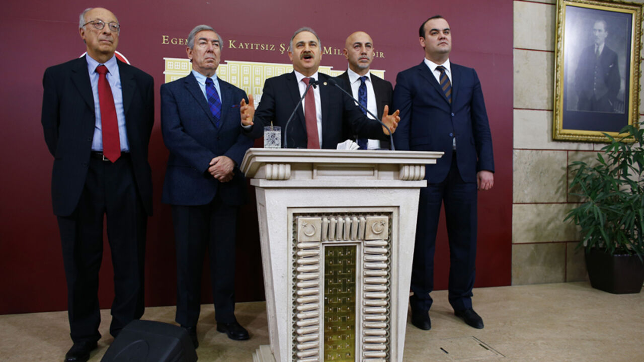 TURKEY-CORRUPTION/COMMISSION (From L to R) Republican People's Party (CHP) MPs Riza Turmen, Osman Koruturk, Levent Gok, Erdal Aksunger and Emre Koprulu attend a news conference in Ankara January 5, 2015. A Turkish parliamentary commission voted on Monday not to send four former ministers accused in a corruption investigation to the Supreme Court for trial, effectively backing President Tayyip Erdogan after a scandal that had rattled his inner circle. REUTERS/Umit Bektas (TURKEY - Tags: POLITICS CRIME LAW) - RTR4K4TW