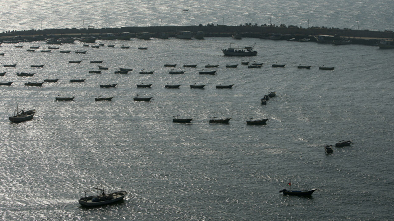 PALESTINIANS-ISRAEL/ISLAND A general view of the Gaza Seaport March 30, 2011. Israel is considering building an artificial island with sea and air ports off blockaded Gaza, as a long-term solution to shipping goods into the Hamas-run Palestinian enclave, the transport minister said. REUTERS/Mohammed Salem (GAZA - Tags: POLITICS TRANSPORT) - RTR2KLWL
