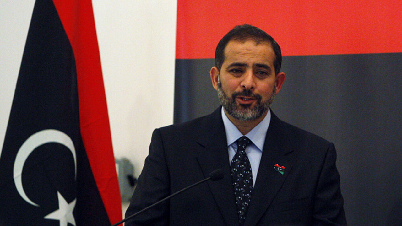 UAE-LIBYA/ The representative of the National Transitional Council, New Libyan Ambassador to the United Arab Emirates Aref Ali Nayed (L) speaks during a news conference next to Libyan Stabilization Minister Ahmed Jehani (R) at Libyan consulate, in Dubai August 21, 2011. REUTERS/Mosab Omar (UNITED ARAB EMIRATES - Tags: POLITICS CIVIL UNREST) - RTR2Q6H4