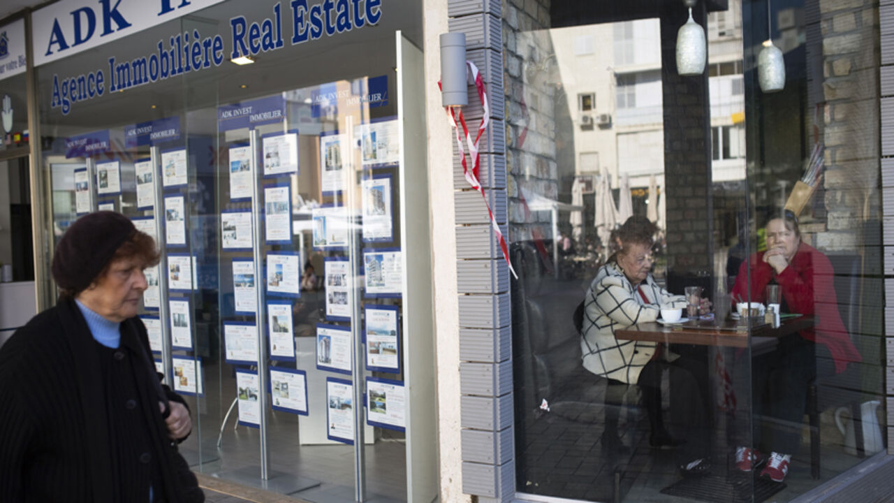 Women sit at a cafe beside a real estate broker's office in Netanya, a city of 180,000 on the Mediterranean north of Tel Aviv, that has become the semi-official capital of the French community in Israel January 20, 2015. For Jews coming to "the Jewish state" from all corners reached by the diaspora, the move may bring relief, but it also raises challenges: a new language and culture, unfamiliar social codes and the difficulty of finding a job. With anti-Semitism rising in France, and their worries stoked by