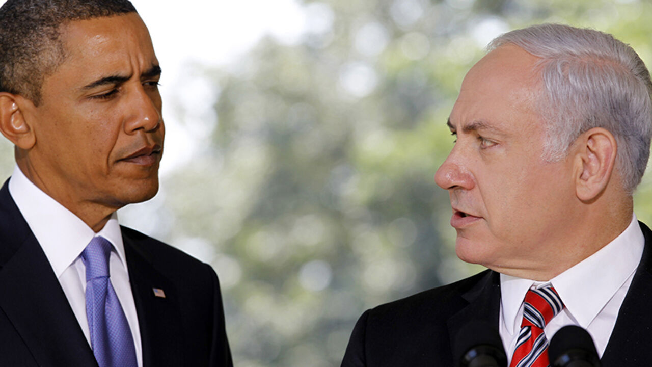 PALESTINIANS-ISRAEL U.S. President Barack Obama (L) listens as Israeli Prime Minister Benjamin Netanyahu delivers a statement to the media from the Colonnade outside the Oval Office of the White House in Washington September 1, 2010. REUTERS/Jason Reed (UNITED STATES - Tags: POLITICS IMAGES OF THE DAY) - RTR2HSTC
