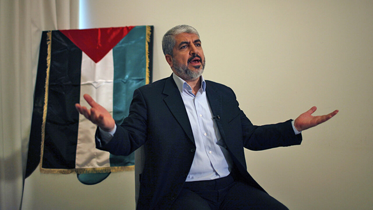 PALESTINIANS-MESHAAL/ Hamas leader Khaled Meshaal gestures during his interview with Reuters in Doha November 29, 2012. Meshaal said the de facto recognition of a sovereign Palestinian state won by his rival Mahmoud Abbas should be seen alongside Gaza's latest conflict with Israel as a single, bold strategy that could empower all Palestinians. Meshaal said the short war which claimed 162 Palestinian lives and five Israelis was concluded on terms set by the Palestinian Islamist movement and ended its isolation, creating a new moo