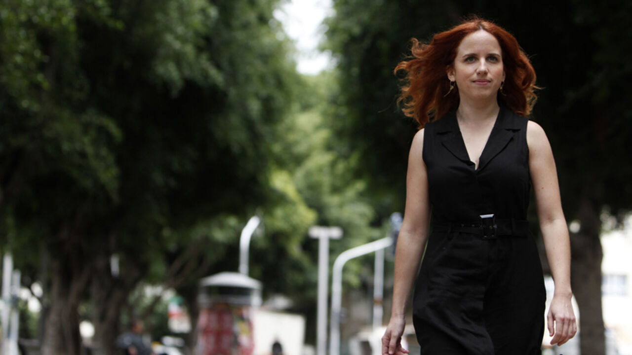 ISRAEL-ELECTION/PROTEST Labour party candidate Stav Shaffir poses on Rothschild Avenue in Tel Aviv, the site of a 2011 protest against high housing costs, December 5, 2012. The leaders of a grassroots social protest movement that swept Israel in 2011, one of them Shaffir, have shot to the top of a rejuvenated Labour party that polls say will at least double its power in a Jan. 22 general election that Prime Minister Benjamin Netanyahu's right-wing Likud is forecast to win. Picture taken December 5, 2012. REUTERS/Amir Cohen (ISRAE