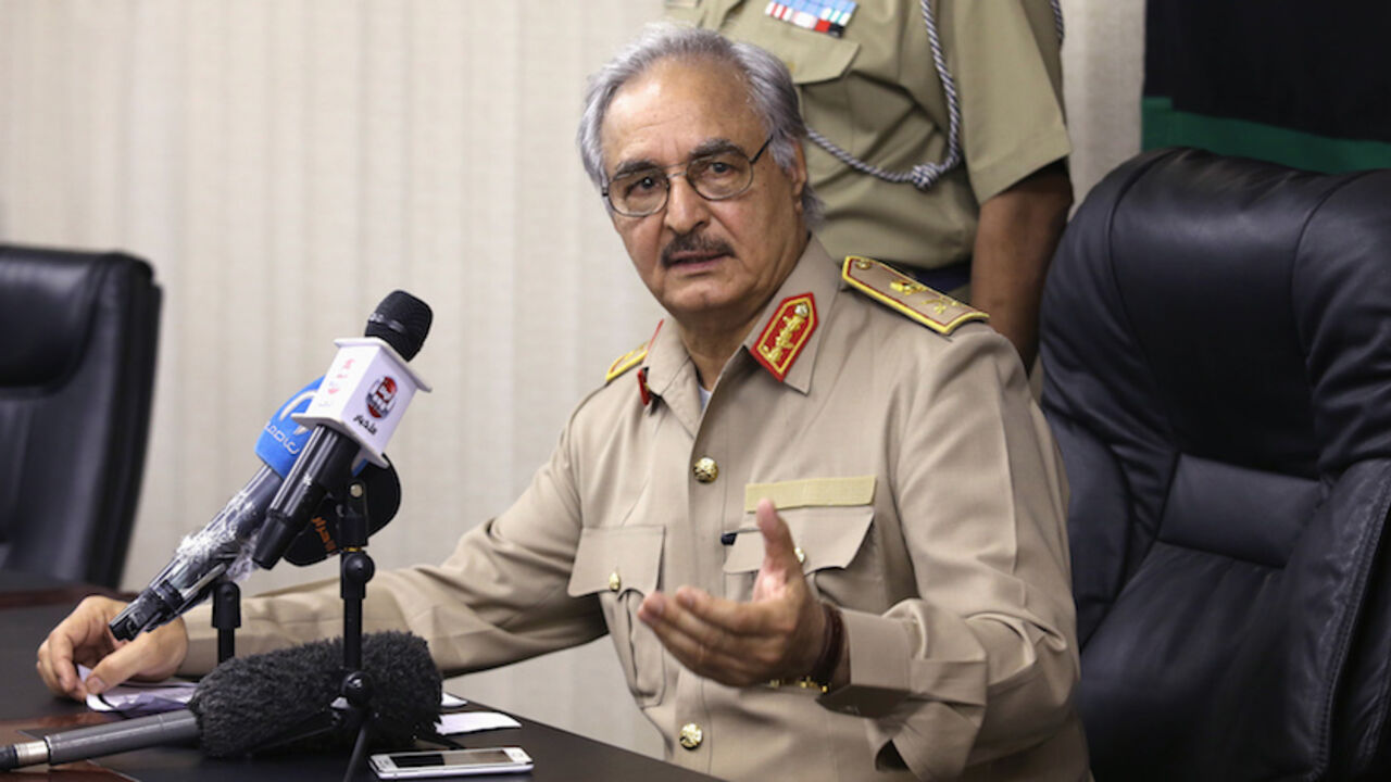 Then-General Khalifa Haftar speaks during a news conference in Abyar, east of Benghazi Then-General Khalifa Haftar speaks during a news conference in Abyar, east of Benghazi May 31, 2014. Growing frustration over the reality of life in eastern Libya, which contrasts with the promises of politicians, is feeding support for Haftar, who has set himself up as a warrior against Islamist militancy and who some also see as their saviour. Picture taken May 31, 2014. REUTERS/Esam Omran Al-Fetori (LIBYA - Tags: CIVIL UNREST POLITICS MILITARY) - RTR4QLUA