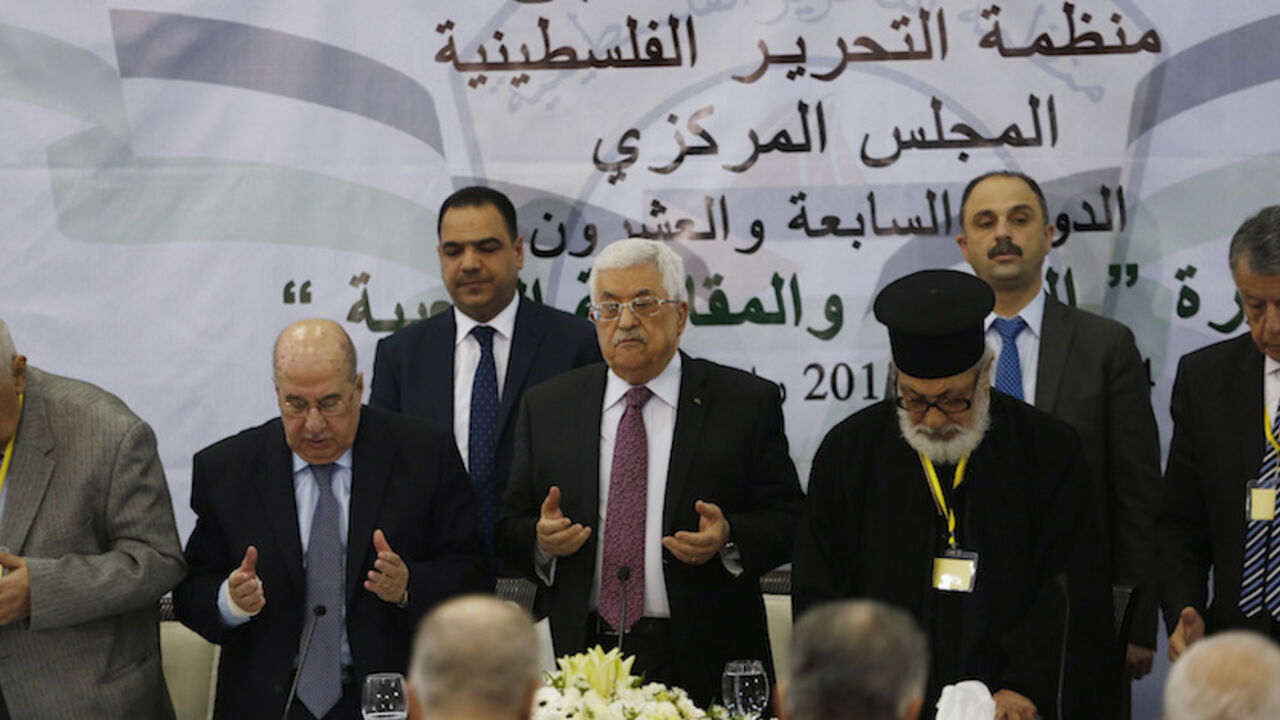 Palestinian President Mahmoud Abbas prays at the start of a meeting for the Central Council of the Palestinian Liberation Organization, in the West Bank city of Ramallah Palestinian President Mahmoud Abbas (C) prays at the start of a meeting for the Central Council of the Palestinian Liberation Organization, in the West Bank city of Ramallah, March 4, 2015. Palestinian leaders began a two-day meeting on Wednesday at which they could decide to suspend security coordination with Israel, a move that would have a profound impact on stability in the occupied West Bank. Relations between the two sides have grown dangerously brittle since the collapse of U.S.-brokered peace talks