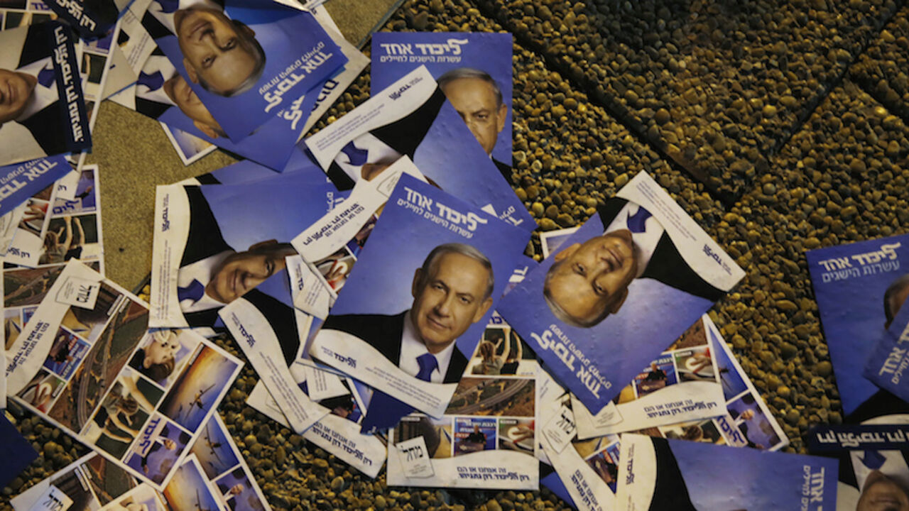 Fliers depicting Israel's Prime Minister Netanyahu are seen on the ground during a right-wing rally in Tel Aviv Fliers depicting Israel's Prime Minister Benjamin Netanyahu are seen on the ground during a right-wing rally in Tel Aviv's Rabin Square March 15, 2015. Israel's centre-left opposition is poised for an upset victory in the upcoming parliamentary election, with the last opinion polls before Tuesday's vote giving it a solid lead over Netanyahu's party. REUTERS/Baz Ratner (ISRAEL - Tags: POLITICS ELECTIONS) - RTR4TGF7