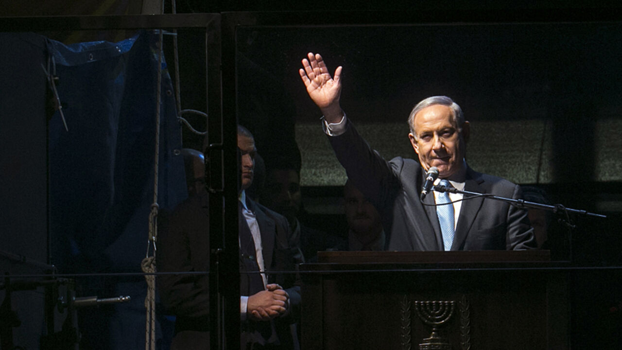 ISRAEL-ELECTIONS/ Israel's Prime Minister Benjamin Netanyahu speaks during a right-wing rally in Tel Aviv's Rabin Square March 15, 2015. Israel's centre-left opposition is poised for an upset victory in the upcoming parliamentary election, with the last opinion polls before Tuesday's vote giving it a solid lead over Prime Minister Benjamin Netanyahu's party. REUTERS/Baz Ratner (ISRAEL - Tags: POLITICS ELECTIONS) - RTR4TGPH