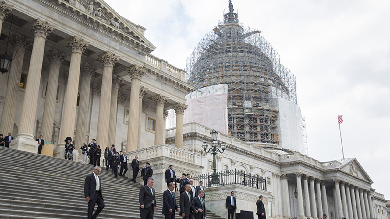 USA-OBAMA/IRISH Representative Steve King (R-NY), Speaker of the House John Boehner (R-OH), U.S. President Barack Obama and Irish Taoiseach Enda Kenny walk down the step of the House of Representatives after having lunch to celebrate St. Patrick's Day on Capitol Hill in Washington on March 17, 2015. REUTERS/Joshua Roberts (UNITED STATES - Tags: POLITICS ANNIVERSARY) - RTR4TQH7
