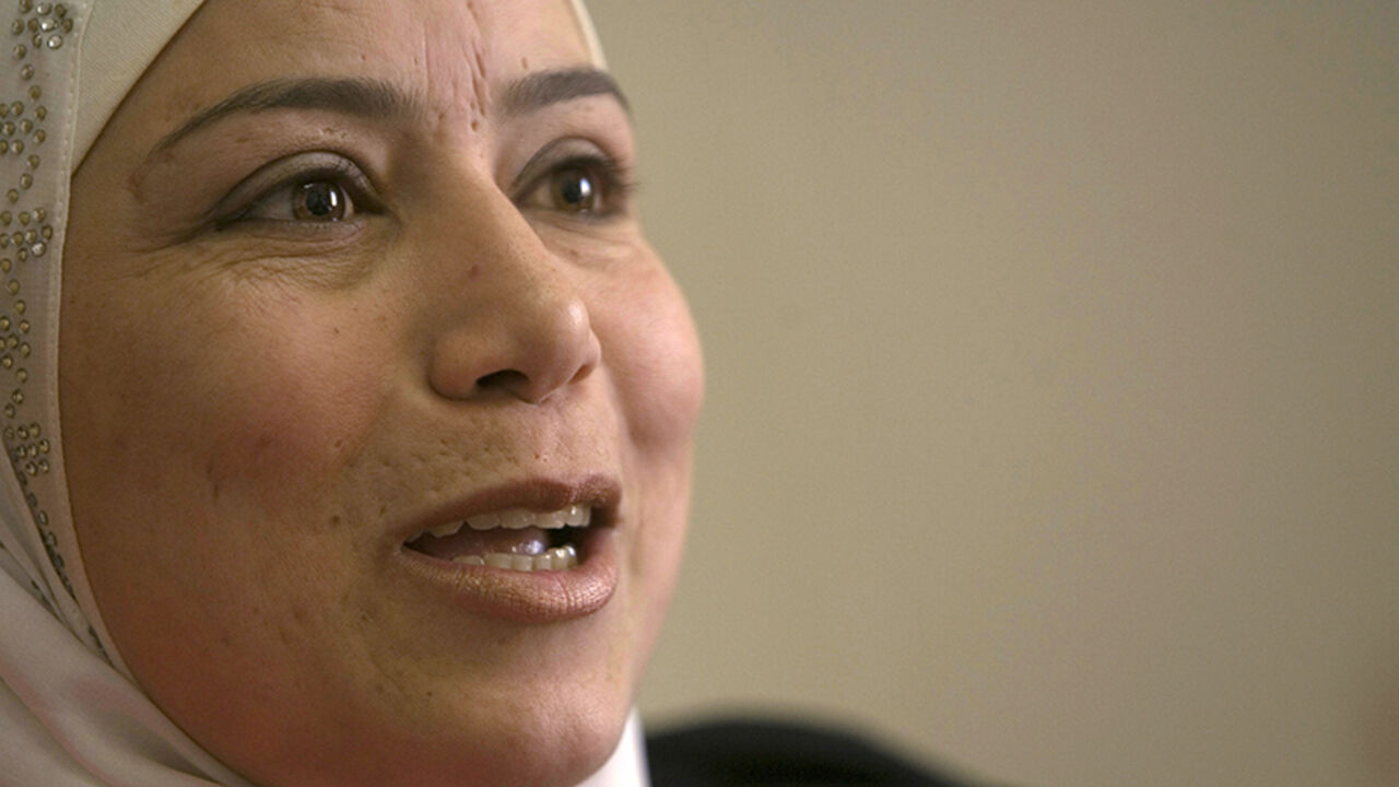 PALESTINIANS/ Newly appointed Palestinian judge Khouloud Al-Faqih speaks during an interview with Reuters in the West Bank city of Ramallah February 23, 2009. Palestinian President Mahmoud Abbas ordered last week the appointment of the first two female judges in the Palestinian Authority, one of them Al-Faqih. Picture taken February 23, 2009.
REUTERS/Fadi Arouri (WEST BANK) - RTXC0RD