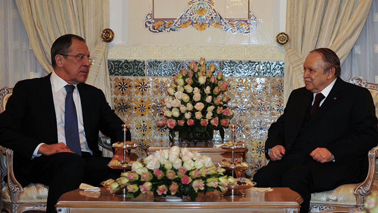 ALGERIA Algeria's President Abdelaziz Bouteflika (R) meets Russia's Foreign Minister Sergei Lavrov at the presidential palace in Algiers February 11, 2013. REUTERS/Stringer (ALGERIA - Tags: POLITICS) - RTR3DNG9