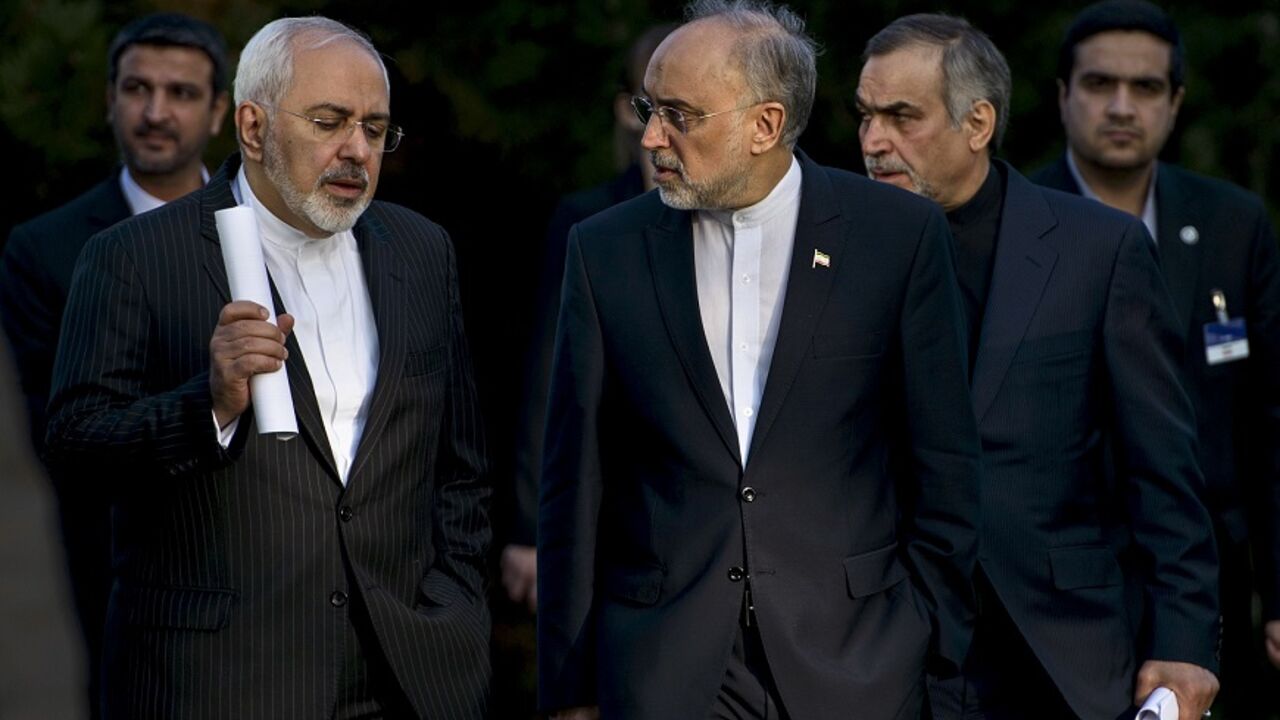Iranian Foreign Minister Zarif talks with Head of the Iranian Atomic Energy Organization Salehi after an afternoon meeting with U.S. Secretary of State Kerry and U.S. officials at the Beau Rivage Palace Hotel in Lausanne Iranian Foreign Minister Javad Zarif (L) talks with Head of the Iranian Atomic Energy Organization Ali Akbar Salehi after an afternoon meeting with U.S. Secretary of State John Kerry and U.S. officials at the Beau Rivage Palace Hotel in Lausanne March 27, 2015.
Major powers and Iran were pushing each other for concessions on Friday ahead of an end-March deadline for a preliminary nuclear deal, with Tehran demanding an immediate end to sanctions and freedom to continue sensitive atomic research, officials s