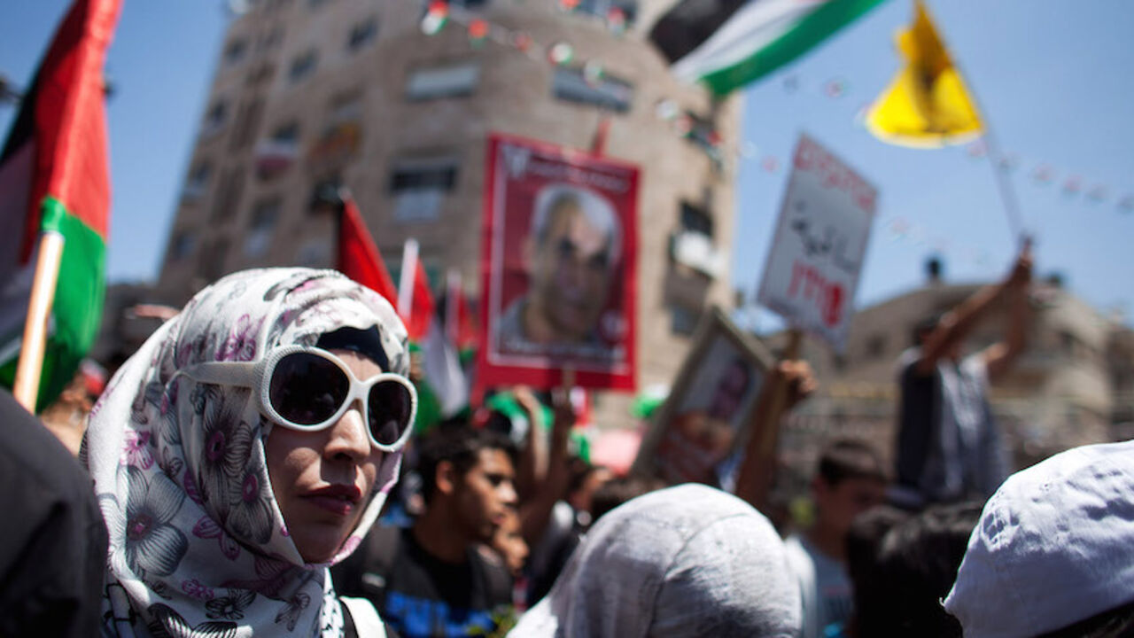 144553451US029_PALESTINIANS RAMALLAH, WEST BANK - MAY 15: Palestinians gather to demonstrate on May 15, 2012 in central Ramallah, West Bank. Palestinians mark Israel's establishment in 1948 with "Nakba" or "catastrophe" day on May 15, to remember the thousands of Palestinians who fled or were expelled during the creation of the Jewish state and the subsequent war. (Photo by Uriel Sinai/Getty Images)